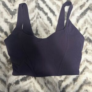 Buffbunny dark purple cover cropped. Cup pads NOT included. Gently worned